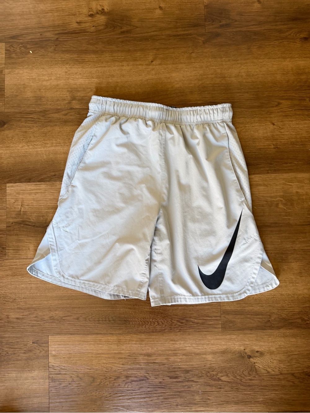 Nike Light Grey Athletic Shorts with Black Swoosh